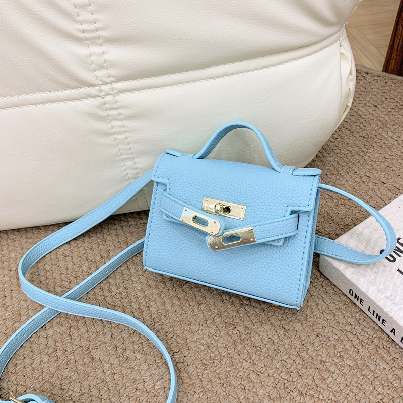 Bolso de hombro para niños y niñas de estilo coreano mini bolso de mensajero para padres e hijos de color sólido simple nuevo monedero con cerradura para niños