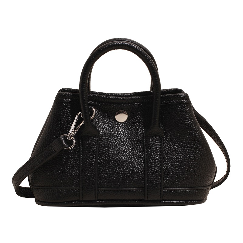 Bolsa de cubo de mano popular de verano para mujeres 2025 nuevo bolso de hombro super caliente universal nicho super caliente mochila