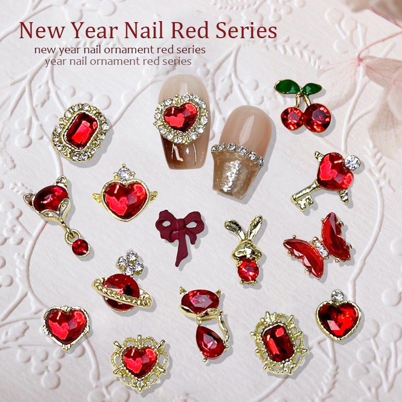 2023 Nueva joyería de uñas Año nuevo rojo aleación conejo rojo mariposa de cristal pintura en aerosol arco accesorios de diamantes de uñas