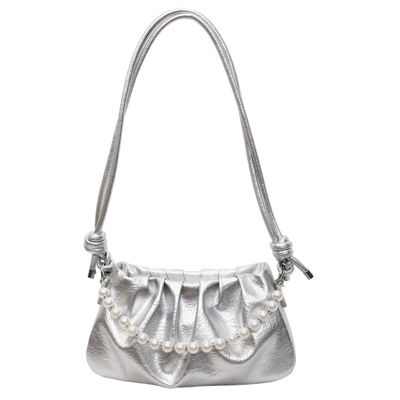 Bolsa de nube plegable de comercio exterior para mujeres 2025 nueva bolsa de brazo de aire extranjero versátil alta sensación de mochila de viaje