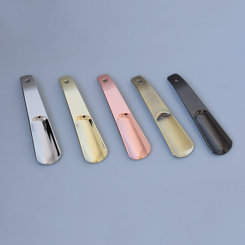 En stock suministro de acero inoxidable 14cm largo pequeño calzador metal espesado zapato extractor dispositivo