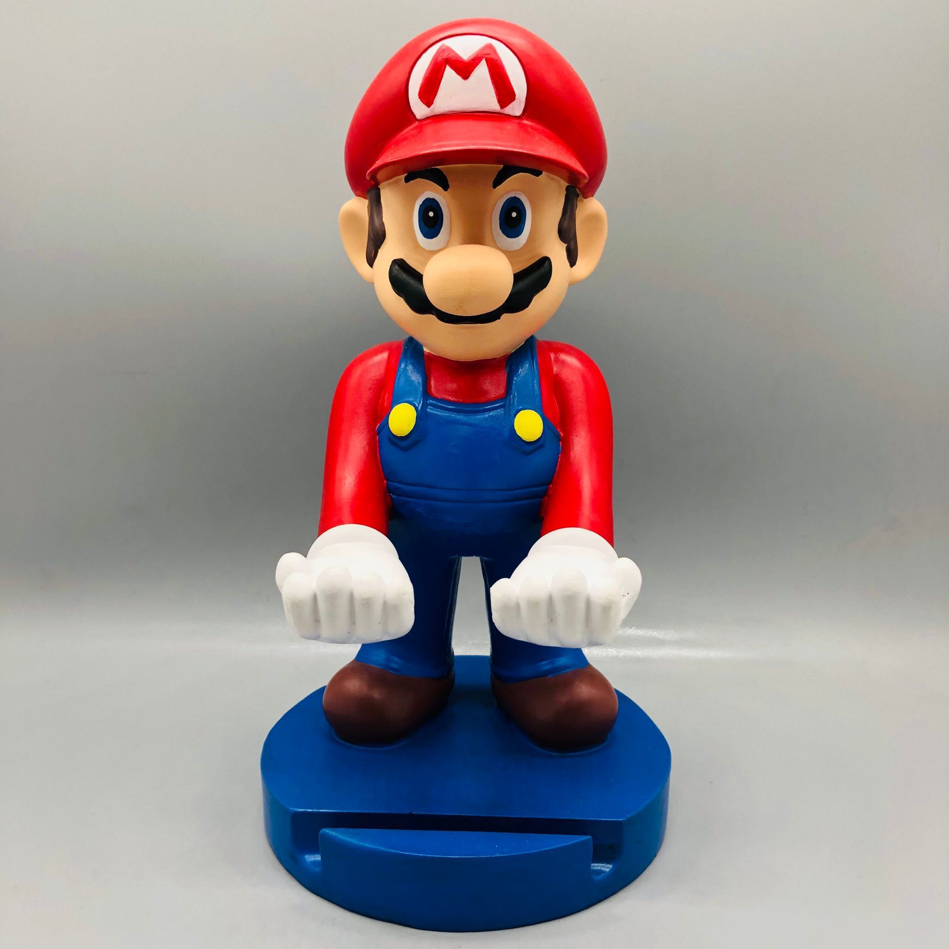 Soporte de teléfono móvil de árbol hombre de dibujos animados de escritorio veneno adornos de estudiantes adornos soporte de mango Fox negro