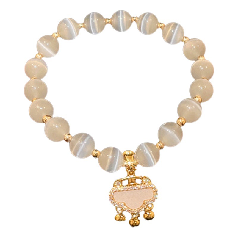 Pulsera de perlas de amor de cristal de fresa artificial, pulsera elástica de alta gama de lujo ligero, fabricante de joyería de todo fósforo de moda image 1