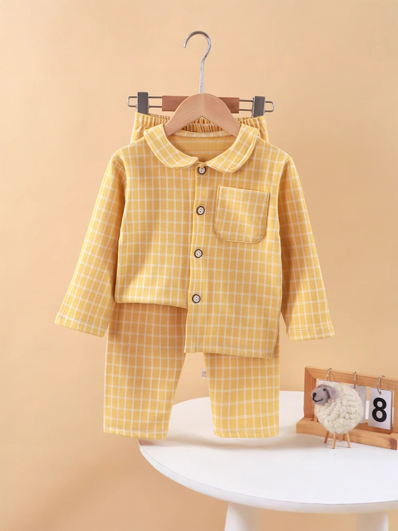 Nuevos productos para niños de otoño y invierno cuadrado de manga larga pijamas sueltos cuadrados de camisa caliente para niños pijamas para el hogar