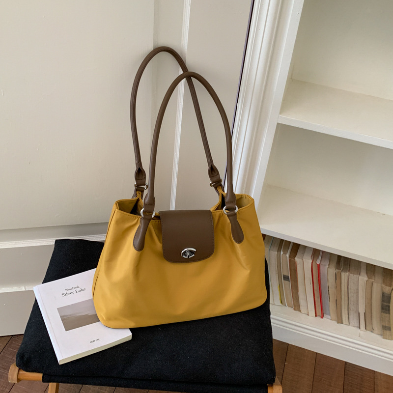 Bolsa de alta calidad de gran capacidad para mujeres 2026 verano nuevo estilo ligero simple hombro brazaleta de viaje bolsa de ocio image 8