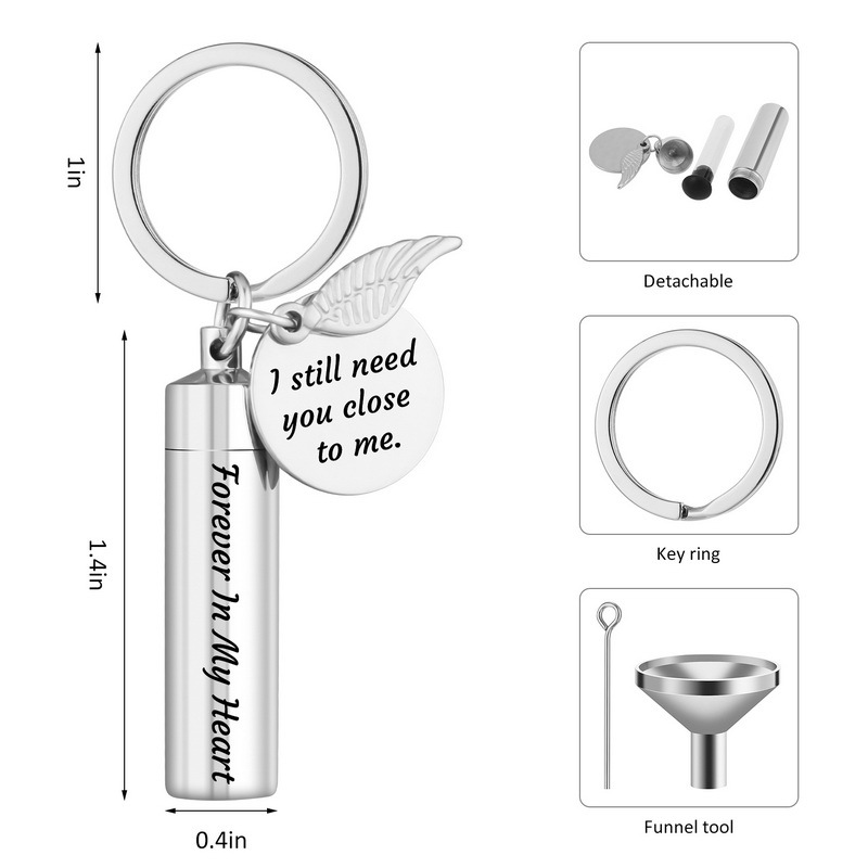 Venta caliente transfronteriza nombre de acero inoxidable grabado cenizas llavero titanio acero perfume esencial aceite botella cenizas caja llavero