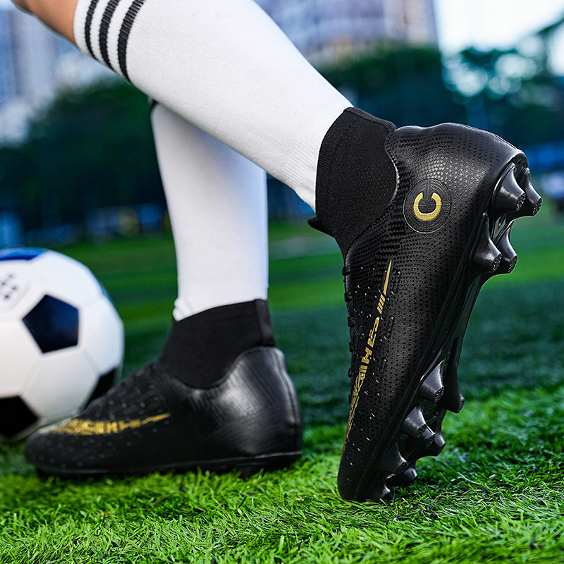 Zapatos de fútbol al por mayor de tamaño grande de alto impacto para niños zapatos de clavos de cuero pegamento de clavos largos zapatos deportivos adolescentes de tamaño grande