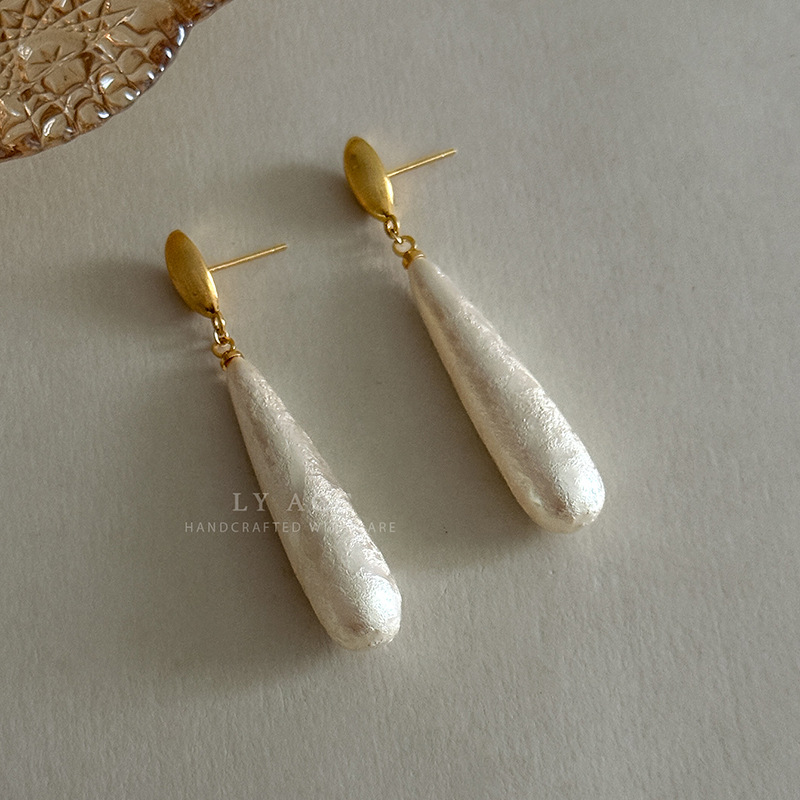 Nuevo estilo chino retro atmósfera cálida y suave nuevo estilo de moda aretes de aretes de borda vestido de algodón perlas largas aretes de aretes de arete de arete de arete