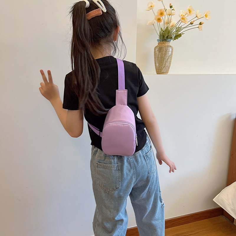 Bolso de pecho coreano para niños y niñas, estilo extranjero, mini bolso de moda de color sólido para niños, 2025 nuevo bolso de comercio exterior para niños