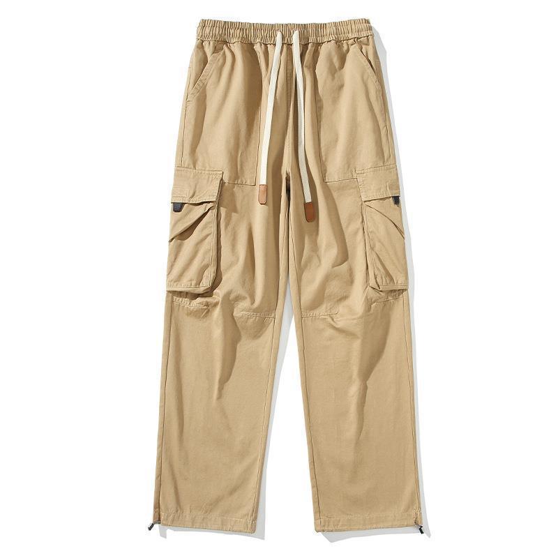 Pantalones de trabajo de bolsillo para hombres de alta gama primavera pantalones deportivos de algodón sueltos japoneses pantalones de moda para hombres jóvenes