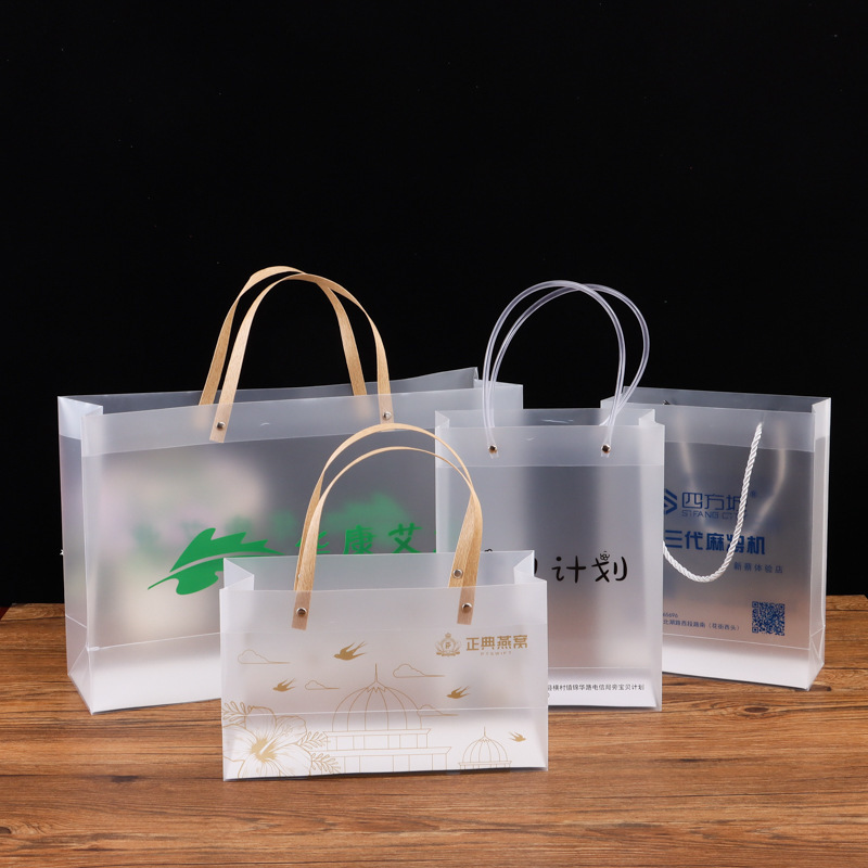 Pp Plastic Transparent Handbag Wholesale Wedding Candy Gift Bag Printing Products Pvc Clothing Cosmetics Packaging Bag Pp Plastic Transparent Handbag Wholesale Wedding Candy Gift Bag Printing Products Pvc Clothing Cosmetics Packaging Bag