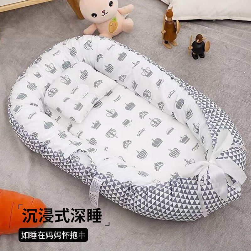 Cama de bebé portátil desmontable transfronteriza en la cama media para recién nacidos acostados para dormir