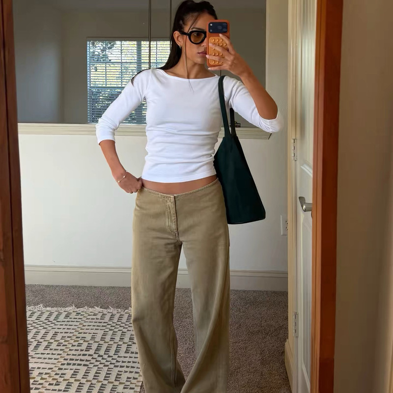 Still here original khaki low-rise jeans, featuring a waistless design and a straight-leg, ankle-length cut