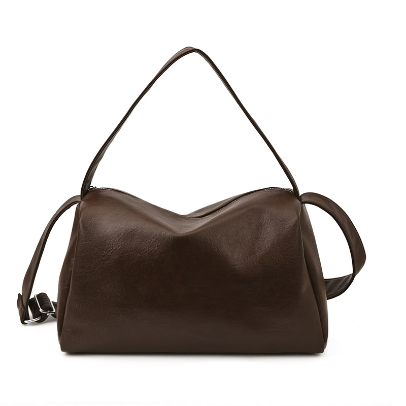 Nicho coreano simple bolsas de almohada de viaje mujeres otoño 2025 nueva gran capacidad extranjera diaria mochila de hombro