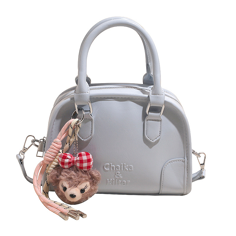 Bolso de béisbol de mano popular de este año para mujer 2025 nuevo bolso de hombro casual de todo fósforo bolso de mensajero de moda de alta gama