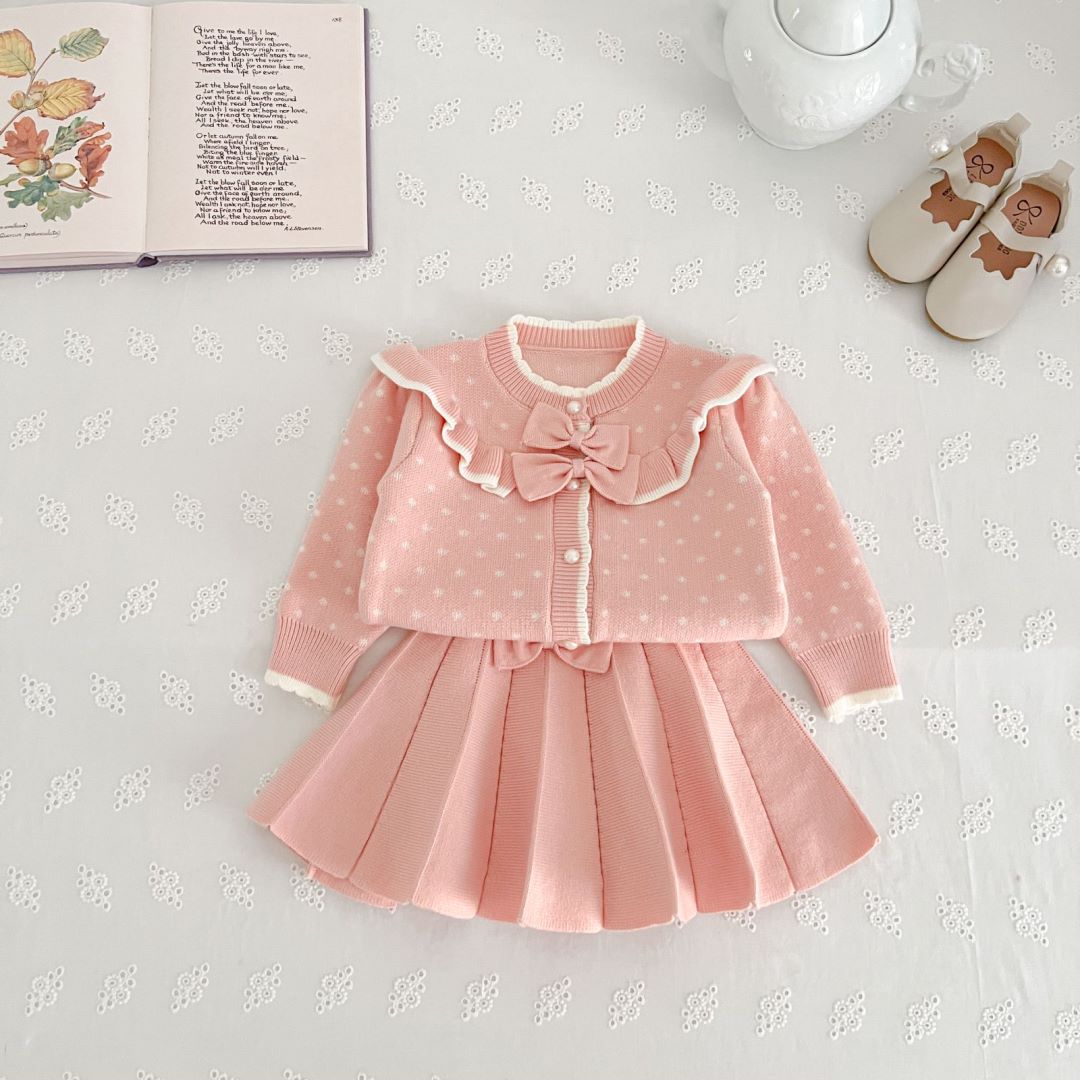 Flickor prickiga barnkläder med rosett och westernstil 2023 höst/vinter nytt koreanskt stickat set med två delar_voghion.com