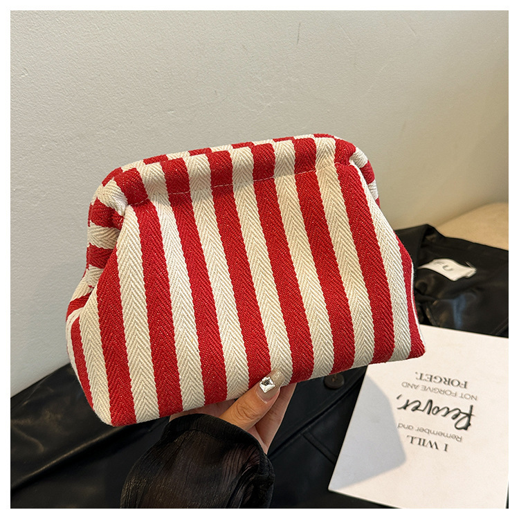 New cross-border fashion color-blocking striped cosmetic bag, women's loose change mobile phone storage bag, trendy and niche cloud clutch undefined