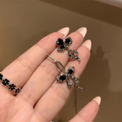 不对称黑锆石蝴蝶结耳环气质个性网红款精致高级设计感女