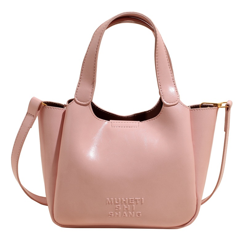 Vintage Maillard bolso de mano para mujeres 2025 nuevo estilo transfronterizo popular aceite cera cuero bolso de cubo textura mochila