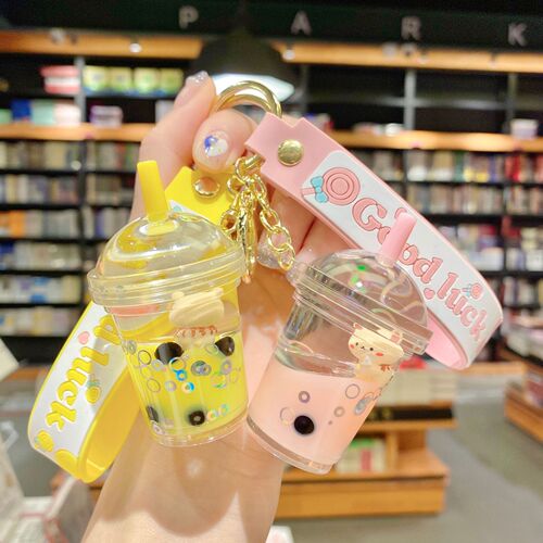 Internet celebrity cartoon oil floating pearl milk tea bear keychain female cute trendy car key chain school bag pendant