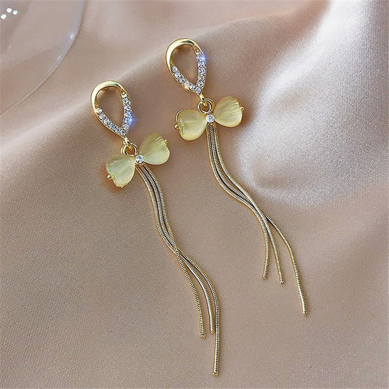 Pendientes largos con flecos elegantes y diamantes con aguja de plata Pendientes de todo fósforo de temperamento de nicho Pendientes simples y ligeros de lujo de alta gama Mujeres