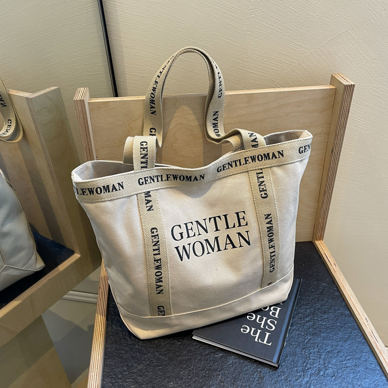 Moda simple lienzo impreso carta bolsa de hombro 2024 gran capacidad de trabajo de alta calidad bolso de mano