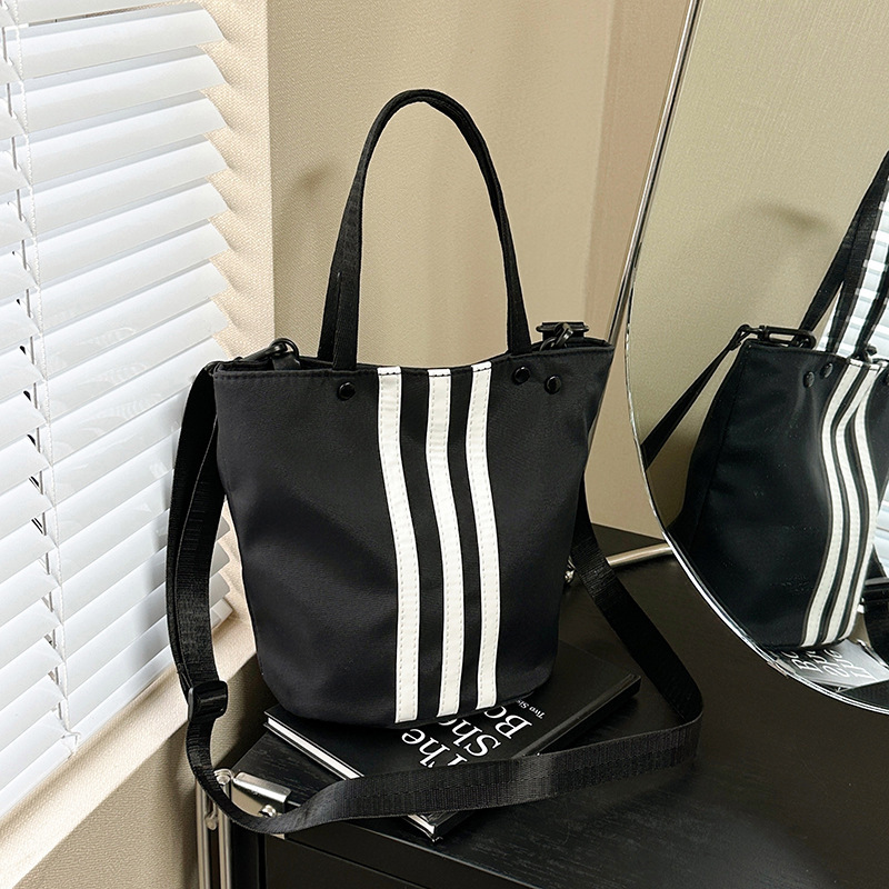 Hand-carried Color-contrast Striped Bucket Bag Women's 2025 New Korean-style Niche Sports Commuter Shoulder Bag All-match Crossbody Bag