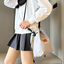 镜头袋收纳包微单数码相机套黑卡内胆包pu保护套单肩款摄影包男女