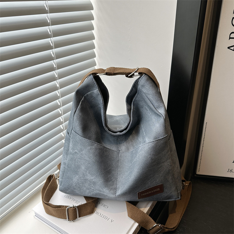 2024 otoño y invierno tendencia de nicho nuevo tipo de mochila de hombro para mujeres moda casual versátil mochila de viaje casual