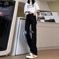 黒い膝の穴が開いているジーパンの男性のタイプの夏のアメリカの高い街のvibeのズボンはやせているまっすぐな筒の曲がった刃のストレートなズボンを現します。