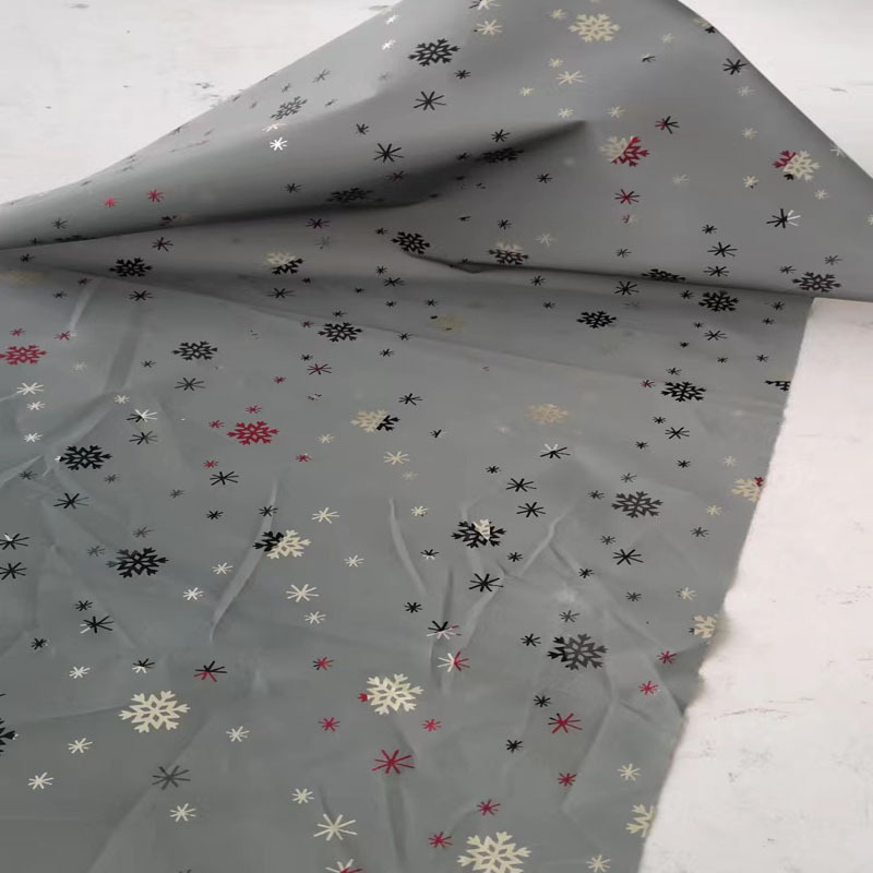 耐水洗镭射涤纶反光布面料棉服夹克用反光布料烫金滚涂反光印花布