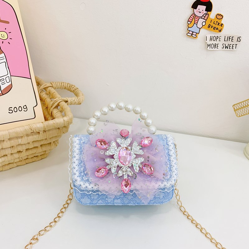 Otoño y invierno coreano arco camellia bolsas de niños de encaje de mano perlas bolsas mochilas para niñas de jardín de infantes