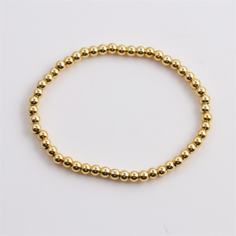 New Korean Copper Plated Real Gold Elastic Round Beads Bracelet Wholesale Nihaojewelry display picture 1