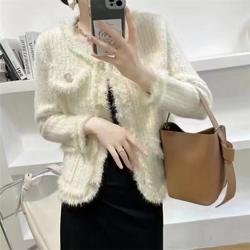 24 invierno Puyuan estilo francés blanco imitación de agua abrigo de invierno de mujeres nuevo estilo de alta calidad