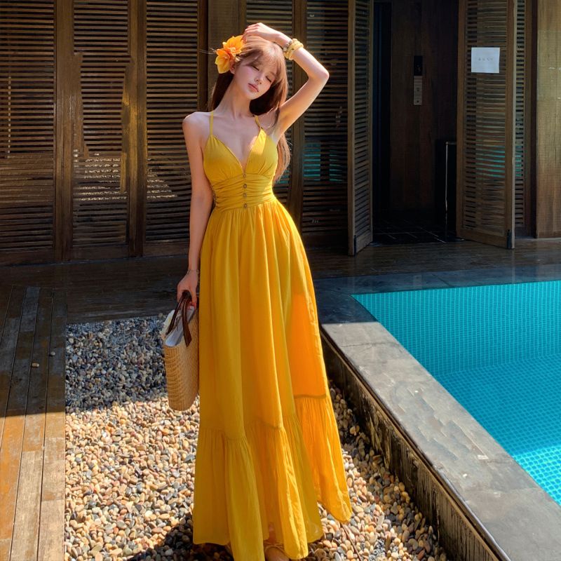 2026 Resort Style Mango Yellow Backless Spaghetti Strap Dress with Built-In Bra Pads and Long Skirt 2026 Resort Style Mango Yellow Backless Spaghetti Strap Dress with Built-In Bra Pads and Long Skirt