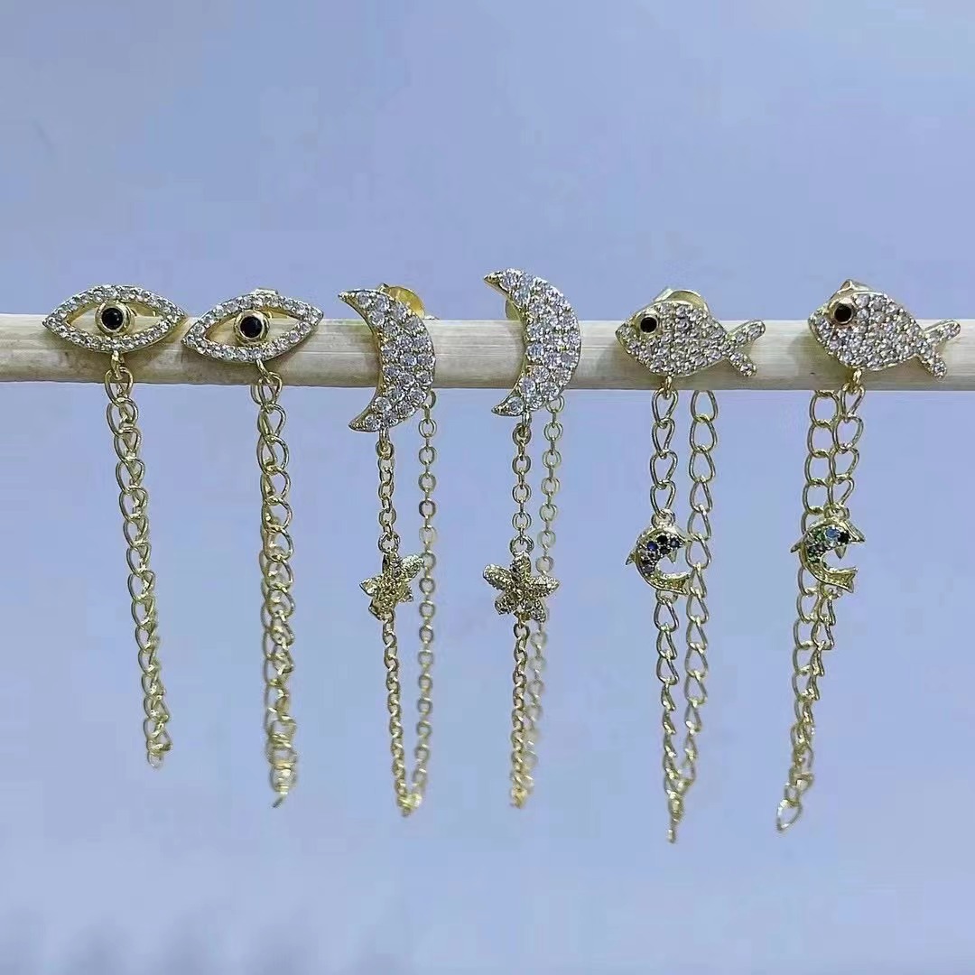 Korean Geometric Irregular Long Tassel Eye Crescent Copper Earrings display picture 1