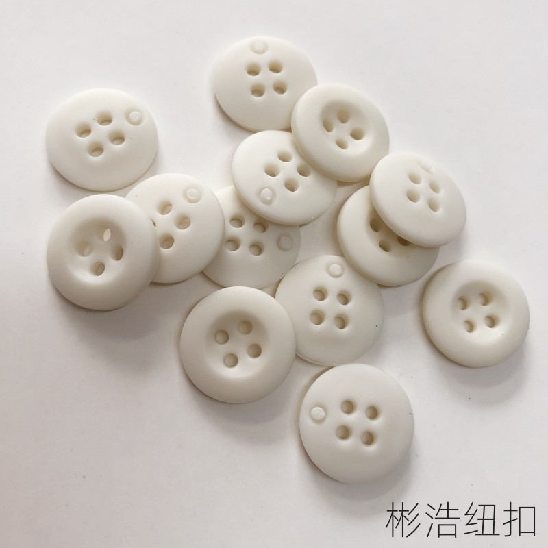 厂家直销四眼橡胶宽边纽扣现货供应橡胶四眼扣子纽扣大衣衬衫扣