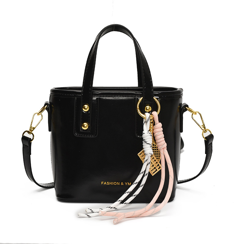 Bolso de cubo de mano para mujer 2025 nuevo estilo de comercio exterior casual bolso de hombro simple casual de viaje casual bolso de mensajero de alta calidad