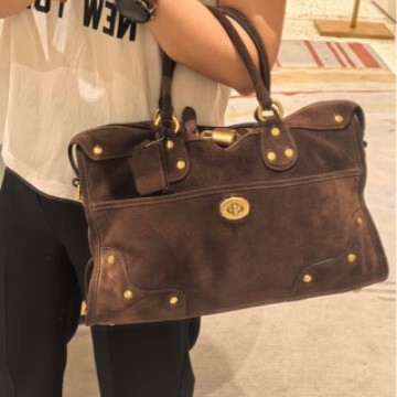 Niche design retro suede studded tote bag 2026 new model women's handbag textured shoulder crossbody bag Niche design retro suede studded tote bag 2026 new model women's handbag textured shoulder crossbody bag