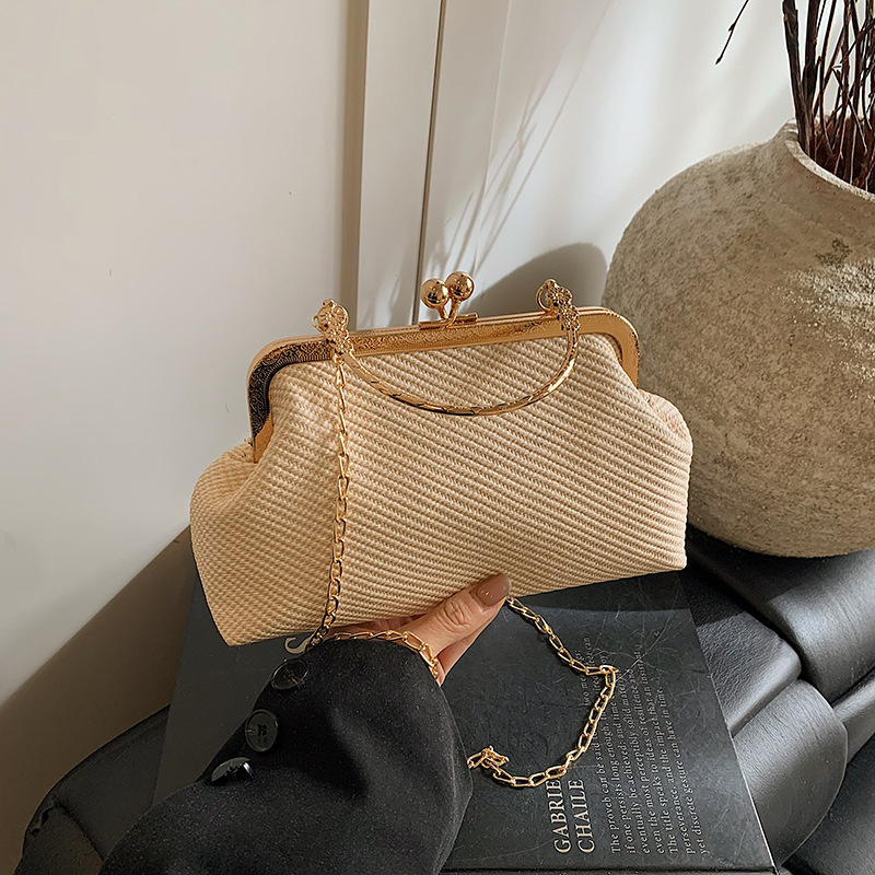 Bolsos de cadena de moda para mujer 2025 primavera nueva tendencia simple bolso de concha de un solo hombro bolso de mensajero casual bolso femenino