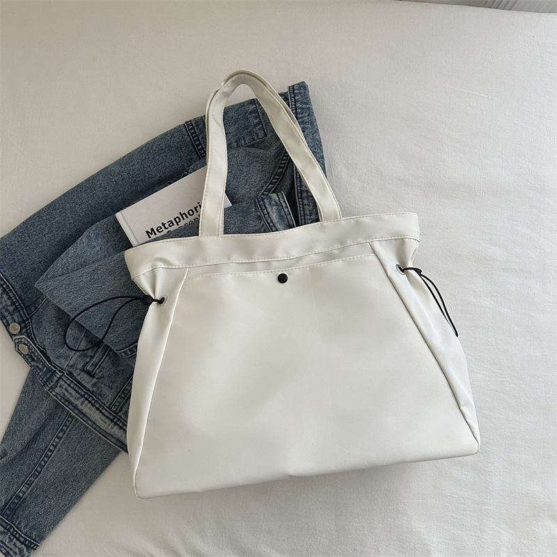 Bolso de lona para mujeres 2024 nuevo este año popular bolsa de gran capacidad de verano universal bolsa de viaje de hombro