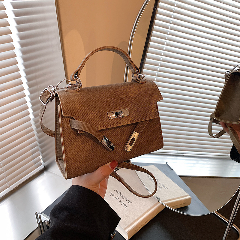 Bolso de mano universal para mujeres 2024 nueva moda texturas Kelly bolso de viaje de hombro bolso de mochila