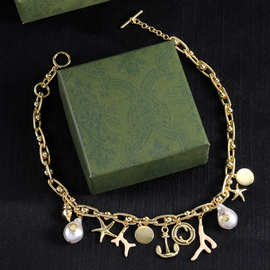 亚马逊新款字母母贝壳海星吊坠珍珠海螺项链女款百搭时尚精致饰品