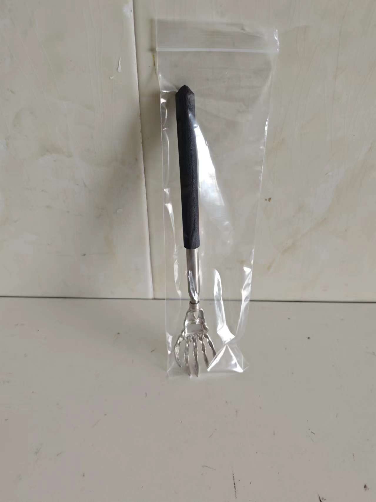 masajeador retráctil de acero inoxidable de mano fantasma, masajeador doméstico, rascador de picazón de acero inoxidable