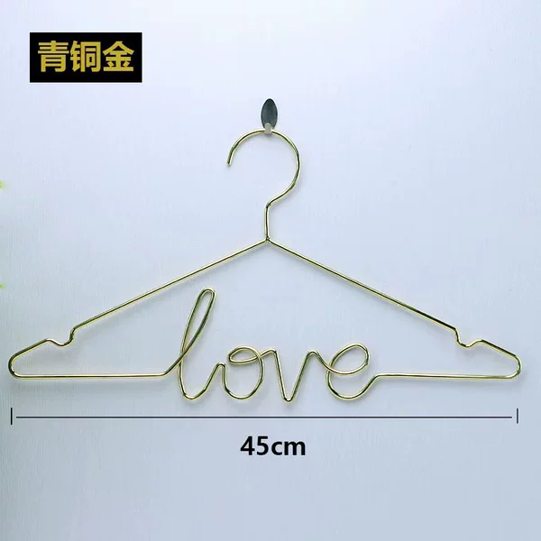 Overall metal hanger love
