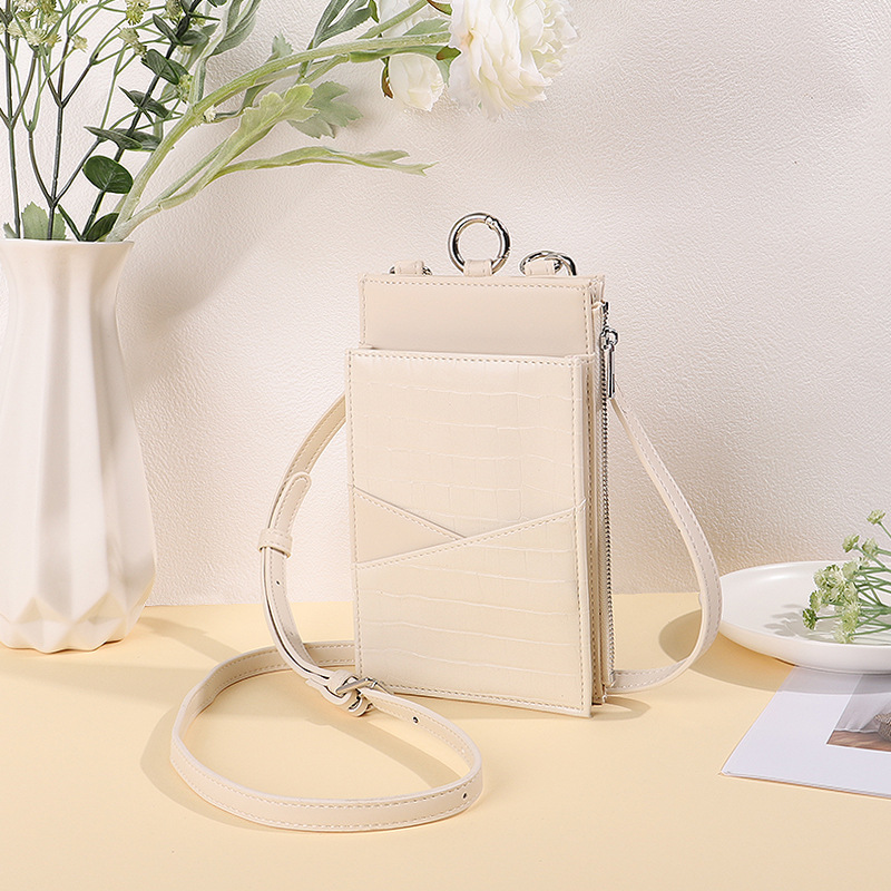 2024 nuevo bolso de mensajero de un solo hombro pequeño bolso pequeño de rombo de estilo japonés fresco bolso de teléfono móvil de mujer con patrón de piedra