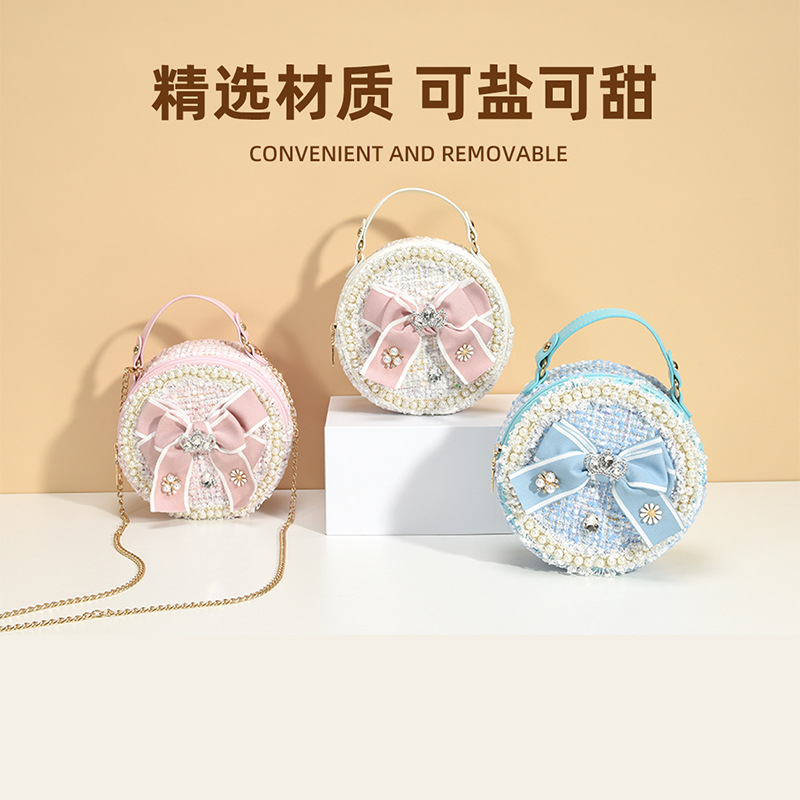 儿童包包2025春夏可爱女童斜挎包ins蝴蝶结手提包小香儿童包包