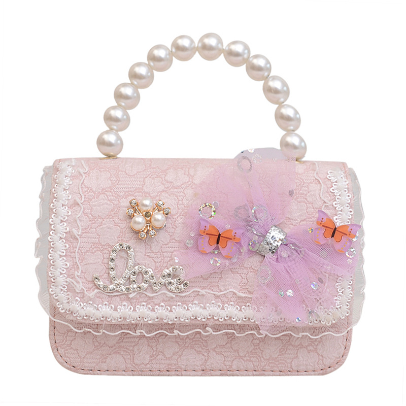 2023 nuevos niños bolsa de mensajero bolsa de moda princesa arco bolso de hombro coreano mini bolso de la cadena de la muchacha