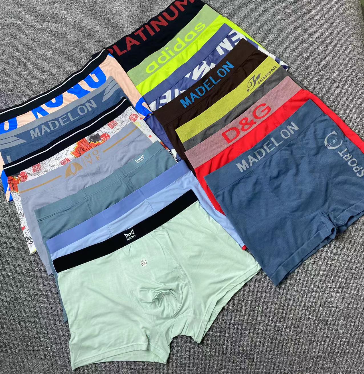 Diverso suelta más tamaño boxeadores ropa interior de moda al por mayor de los hombres El Comercio exterior europeo y americano sin costuras ropa interior ultrafina transpirable mezclado