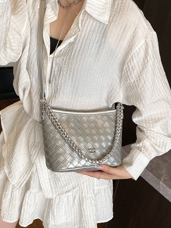 Comercio exterior transfronterizo cadena de moda tejida bolso de cubo portátil mujer 2025 nuevo estilo de alta calidad mochila de viaje